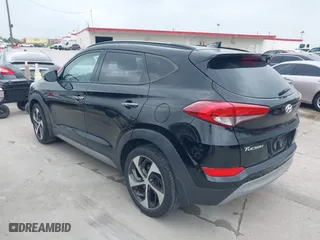 2017 Hyundai Tucson Value with VIN KM8J33A26HU362363, listed as a IAAI auction lot 41940376 with 127,986 mi miles. Bid and sale history available at carsss.com. Image 3.