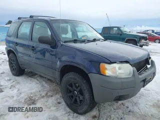 2003 Ford Escape XLS Popular with VIN 1FMYU92153KE01890, listed as a IAAI auction lot 41605087 with 109,411 mi miles. Bid and sale history available at carsss.com. Image 1.