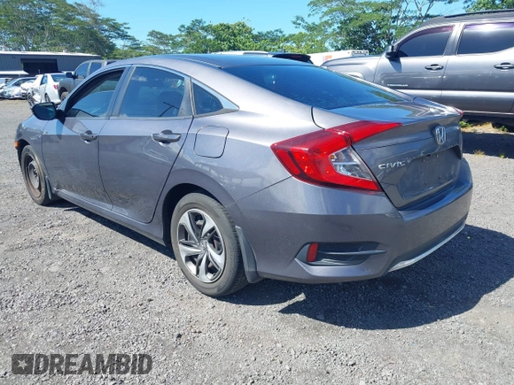 2020 Honda Civic LX z VIN 19XFC2F67LE001375, wystawiony jako IAAI lot #42033879 z przebiegiem 79 941 mil mil oraz . Historia ofert i sprzedaży dostępna na DreamBid. Obrazek 3.