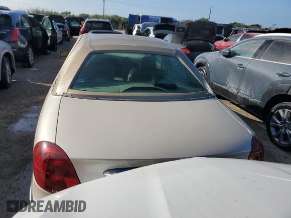 2002 Lincoln Continental with VIN 1LNHM97V32Y694132, listed as a Copart auction lot 76410144 with 0 mi miles and Non Repairable. Bid and sale history available at carsss.com. Image 6.