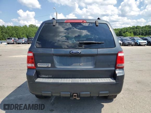 2008 Ford Escape XLT with VIN 1FMCU03178KA55787, listed as a Copart auction lot 64784465 with 2,235,503 mi miles and Clean title. Bid and sale history available at DreamBid. Image 6.