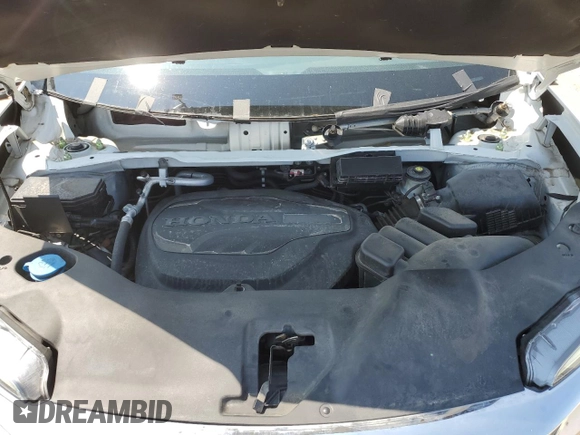 2022 Honda Pilot Elite with VIN 5FNYF6H08NB059590, listed as a Copart auction lot 57460235 with 67,593 mi miles and Salvage title. Bid and sale history available at DreamBid. Image 12.