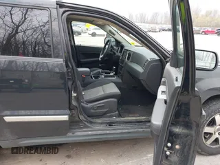 2009 Jeep Grand Cherokee Laredo with VIN 1J8GR48K19C546439, listed as a IAAI auction lot 42097256 with 146,930 mi miles. Bid and sale history available at carsss.com. Image 5.
