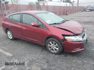 2010 Honda Insight EX with VIN JHMZE2H77AS038268, listed as a IAAI auction lot 41885471 with 231,298 mi miles and . Bid and sale history available at carsss.com. Image 1.