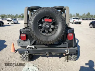 2004 Jeep Wrangler Sahara with VIN 1J4FA59S04P772756, listed as a Copart auction lot 47973495 with 92,685 mi miles and Salvage Title. Bid and sale history available at DreamBid. Image 6.