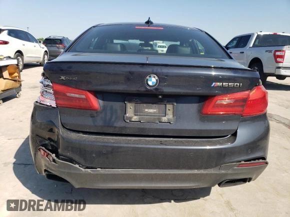 2019 BMW 5 Series M550i xDrive z VIN WBAJB9C56KB464277, wystawiony jako Copart lot #52348835 z przebiegiem 46 131 mil mil oraz Szkoda całkowita • Salvage title. Historia ofert i sprzedaży dostępna na DreamBid. Obrazek 6.