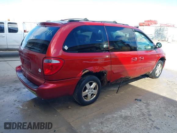 2005 Dodge Grand Caravan with VIN 2D4G944L75R310409, listed as a IAAI auction lot 41781132 with 128,120 mi miles and . Bid and sale history available at DreamBid. Image 4.