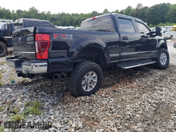 2020 Ford F-250 XL with VIN 1FT8W2BTXLEE30615, listed as a Copart auction lot 60626295 with 142,318 mi miles and Salvage title. Bid and sale history available at DreamBid. Image 3.