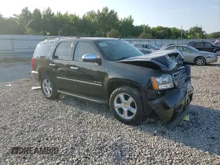2014 Chevrolet Tahoe LTZ z VIN 1GNSCCE0XER103558, wystawiony jako Copart lot #67590424 z przebiegiem Nie podano mil oraz Szkoda całkowita • Salvage title. Historia ofert i sprzedaży dostępna na DreamBid. Obrazek 12.