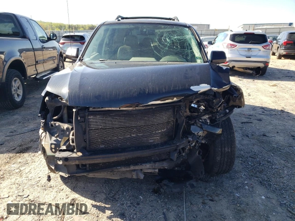 2011 Mercury Mariner Premier with VIN 4M2CN8HG3BKJ00612, listed as a Copart auction lot 53490645 with 154,119 mi miles and Salvage title. Bid and sale history available at DreamBid. Image 5.