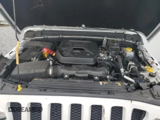 2023 Jeep Wrangler Willys with VIN 1C4HJXDN8PW625204, listed as a Copart auction lot 59328065 with 18,116 mi miles and Salvage title. Bid and sale history available at DreamBid. Image 11.