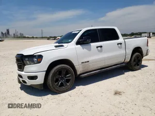 2023 Ram 1500 Big Horn with VIN 1C6SRFFT7PN698730, listed as a Copart auction lot 56967445 with 30,514 mi miles and Salvage title. Bid and sale history available at DreamBid. Image 1.