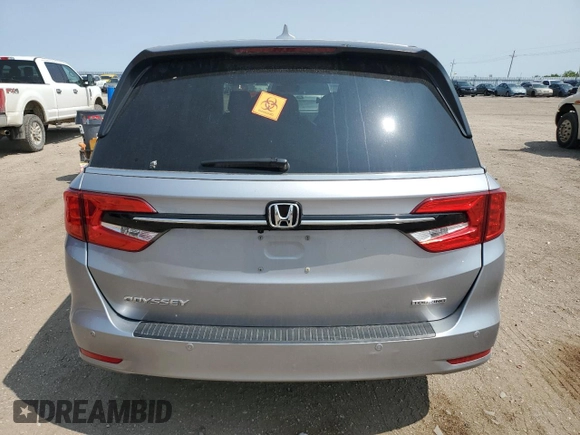 2022 Honda Odyssey Touring с VIN 5FNRL6H85NB056617, выставлен на аукционе Copart как лот 59208295 с пробегом 26 000 миль миль и Списание • Salvage title. История ставок и продаж доступна на DreamBid. Изображение 6.