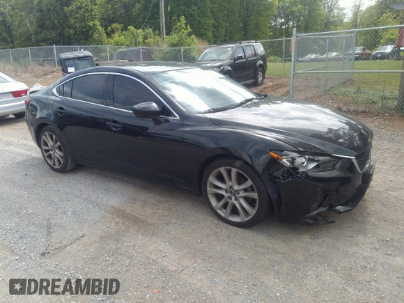2015 Mazda 6 i Grand Touring with VIN JM1GJ1W68F1168078, listed as a IAAI auction lot 42149519 with 127,641 mi miles and . Bid and sale history available at DreamBid. Image 1.