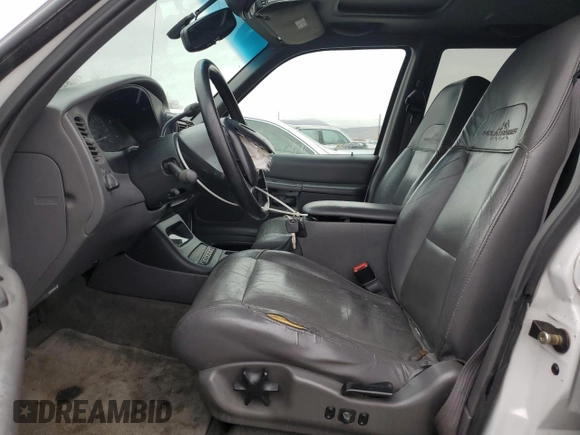 2000 Mercury Mountaineer z VIN 4M2ZU86P9YUJ19811, wystawiony jako Copart lot #82211724 z przebiegiem 251 761 mil mil oraz Szkoda całkowita • Salvage title. Historia ofert i sprzedaży dostępna na DreamBid. Obrazek 7.