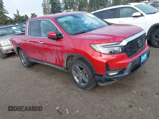 2022 Honda Ridgeline RTL-E with VIN 5FPYK3F74NB011358, listed as a IAAI auction lot 41431157 with 26,116 mi miles and . Bid and sale history available at DreamBid. Image 1.