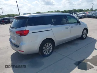2018 Kia Sedona EX with VIN KNDMC5C12J6345930, listed as a IAAI auction lot 42008064 with 214,465 mi miles and . Bid and sale history available at carsss.com. Image 4.
