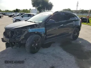 2015 Cadillac SRX Performance Collection с VIN 3GYFNCE32FS558430, выставлен на аукционе Copart как лот 63633865 с пробегом 153 729 миль миль и Списание • Salvage title. История ставок и продаж доступна на DreamBid. Изображение 1.