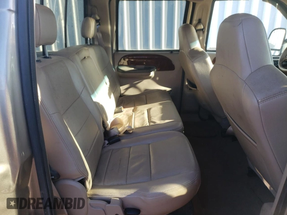 2004 Ford F-350 XL z VIN 1FTSW31P74EB59689, wystawiony jako Copart lot #87101184 z przebiegiem 240 134 mil mil oraz Szkoda całkowita • Salvage title. Historia ofert i sprzedaży dostępna na DreamBid. Obrazek 10.