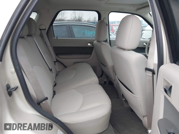 2011 Mercury Mariner z VIN 4M2CN8B76BKJ06851, wystawiony jako IAAI lot #41652014 z przebiegiem 118 914 mil mil oraz . Historia ofert i sprzedaży dostępna na DreamBid. Obrazek 8.