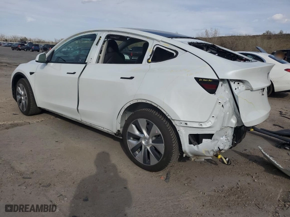 2021 Tesla Model Y Long Range with VIN 5YJYGDEEXMF299515, listed as a Copart auction lot 51978555 with 30,459 mi miles and Salvage Title. Bid and sale history available at carsss.com. Image 2.