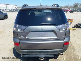 2009 Mitsubishi Outlander ES with VIN JA4LT21W59Z006995, listed as a IAAI auction lot 41639949 with 216,605 mi miles. Bid and sale history available at carsss.com. Image 16.