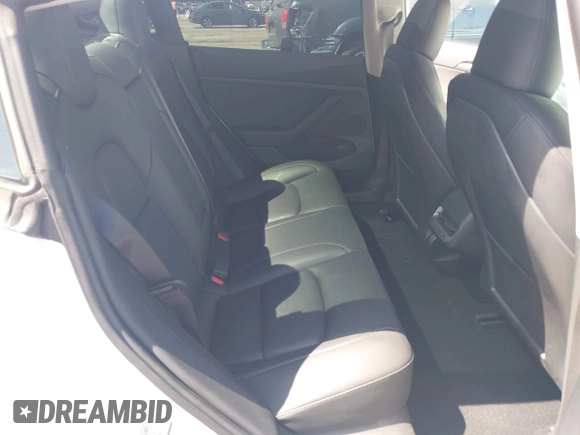 2023 Tesla Model 3 with VIN 5YJ3E1EA0PF621448, listed as a IAAI auction lot 42500155 with 26,589 mi miles and . Bid and sale history available at DreamBid. Image 8.
