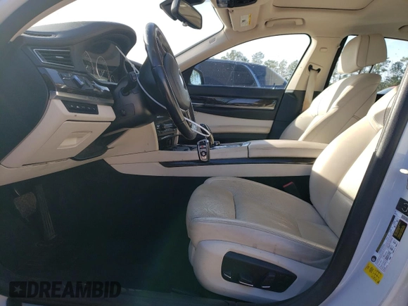 2013 BMW 7 Series 750i with VIN WBAYA8C55DC996693, listed as a Copart auction lot 80233423 with 140,925 mi miles and Salvage Title. Bid and sale history available at DreamBid. Image 7.