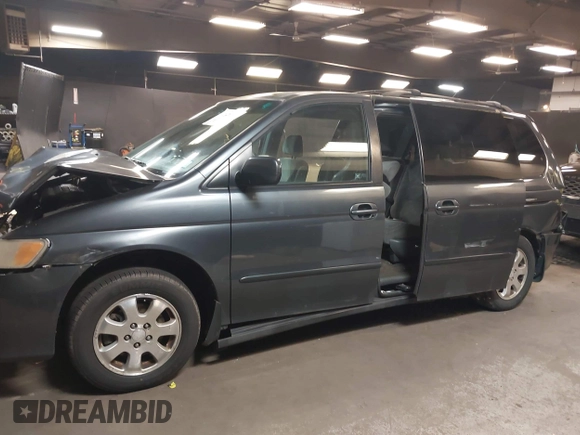 2004 Honda Odyssey EX-RES z VIN 5FNRL18814B092516, wystawiony jako IAAI lot #42108211 z przebiegiem 214 312 mil mil oraz . Historia ofert i sprzedaży dostępna na DreamBid. Obrazek 15.