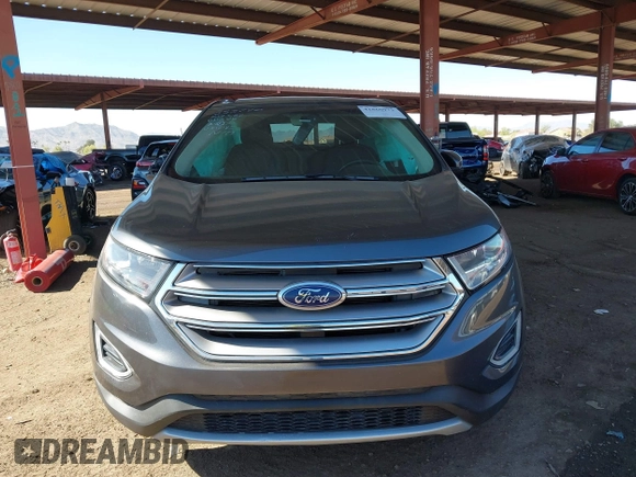 2015 Ford Edge Titanium z VIN 2FMTK3K90FBC12582, wystawiony jako IAAI lot #41860973 z przebiegiem Nie podano mil oraz . Historia ofert i sprzedaży dostępna na DreamBid. Obrazek 11.