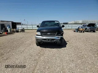 2000 Ford F-150 XL with VIN 2FTRX18L2YCA62429, listed as a Copart auction lot 56033895 with 180,156 mi miles and Non repairable. Bid and sale history available at DreamBid. Image 13.