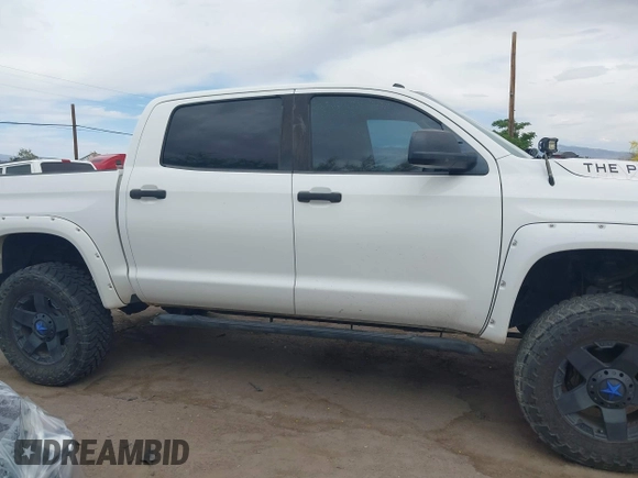 2016 Toyota Tundra SR5 z VIN 5TFDW5F15GX491017, wystawiony jako IAAI lot #42033427 z przebiegiem 97 290 mil mil oraz . Historia ofert i sprzedaży dostępna na DreamBid. Obrazek 13.