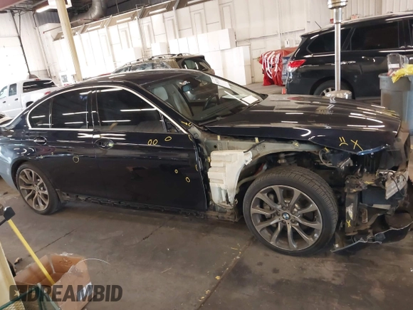 2014 BMW 5 Series 535i with VIN WBA5B1C54ED477539, listed as a IAAI auction lot 40812585 with 94,541 mi miles and . Bid and sale history available at DreamBid. Image 14.