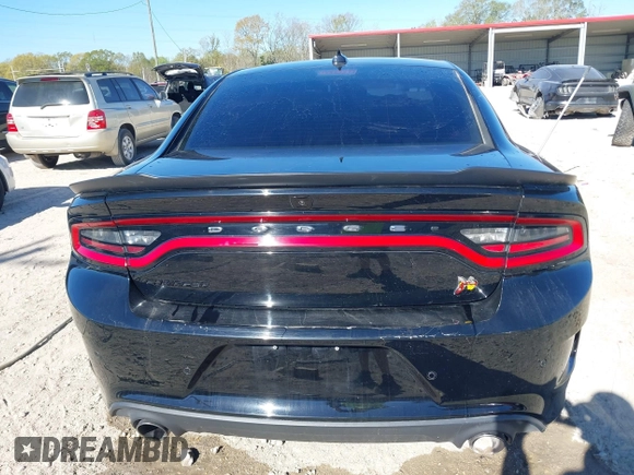 2022 Dodge Charger Scat Pack with VIN 2C3CDXGJ7NH125951, listed as a IAAI auction lot 41811902 with 24,399 mi miles and . Bid and sale history available at carsss.com. Image 16.