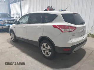 2014 Ford Escape SE with VIN 1FMCU9GX0EUC76506, listed as a IAAI auction lot 42131024 with 117,897 mi miles and . Bid and sale history available at carsss.com. Image 3.