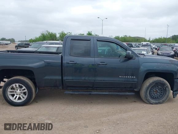 2018 Chevrolet Silverado 1500 LT with VIN 1GCRCREC9JZ105218, listed as a IAAI auction lot 40778682 with 124,621 mi miles and . Bid and sale history available at DreamBid. Image 13.