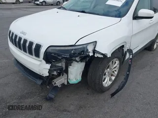 2020 Jeep Cherokee Latitude with VIN 1C4PJLCB5LD618650, listed as a IAAI auction lot 41634691 with 90,341 mi miles. Bid and sale history available at carsss.com. Image 6.