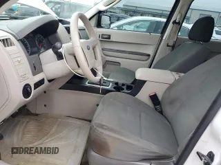 2011 Ford Escape XLS with VIN 1FMCU0C71BKB89898, listed as a Copart auction lot 52240445 with 180,201 mi miles and Salvage title. Bid and sale history available at DreamBid. Image 7.
