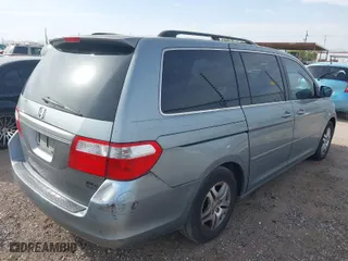 2007 Honda Odyssey EX-L with VIN 5FNRL38617B021850, listed as a IAAI auction lot 41852809 with 136,892 mi miles. Bid and sale history available at carsss.com. Image 4.