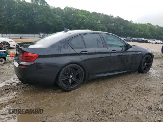 2014 BMW M5 z VIN WBSFV9C58ED097285, wystawiony jako Copart lot #55835345 z przebiegiem 108 189 mil mil oraz Szkody całkowita. Historia ofert i sprzedaży dostępna na DreamBid. Obrazek 3.