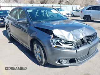 2012 Volkswagen Jetta TDI w/Premium & Nav z VIN 3VWLL7AJ5CM361646, wystawiony jako IAAI lot #41856672 z przebiegiem 190 292 mil mil oraz . Historia ofert i sprzedaży dostępna na DreamBid. Obrazek 1.