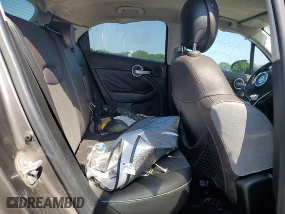 2016 FIAT 500X Lounge z VIN ZFBCFYDTXGP383559, wystawiony jako Copart lot #61990675 z przebiegiem 149 709 mil mil oraz Czysty tytuł • Clean title. Historia ofert i sprzedaży dostępna na DreamBid. Obrazek 11.
