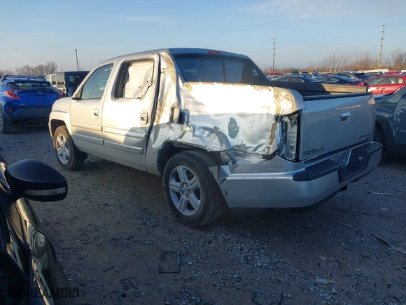 2014 Honda Ridgeline RTL with VIN 5FPYK1F57EB009199, listed as a IAAI auction lot 41208488 with 100,340 mi miles. Bid and sale history available at carsss.com. Image 3.