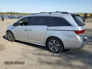 2014 Honda Odyssey Touring with VIN 5FNRL5H94EB094357, listed as a Copart auction lot 53930635 with 210,448 mi miles and Salvage Title. Bid and sale history available at carsss.com. Image 2.