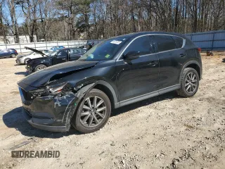 2018 Mazda CX-5 Grand Touring z VIN JM3KFADM0J1332842, wystawiony jako Copart lot #46753725 z przebiegiem 88 063 mil mil oraz Szkoda całkowita • Salvage title. Historia ofert i sprzedaży dostępna na DreamBid. Obrazek 1.