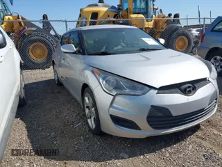 2012 Hyundai Veloster w/Black Int z VIN KMHTC6AD4CU021595, wystawiony jako IAAI lot #42004371 z przebiegiem 149 637 mil mil oraz . Historia ofert i sprzedaży dostępna na DreamBid. Obrazek 1.