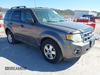 2011 Ford Escape XLT with VIN 1FMCU0D74BKA81385, listed as a IAAI auction lot 41895835 with 238,298 mi miles. Bid and sale history available at carsss.com. Image 1.