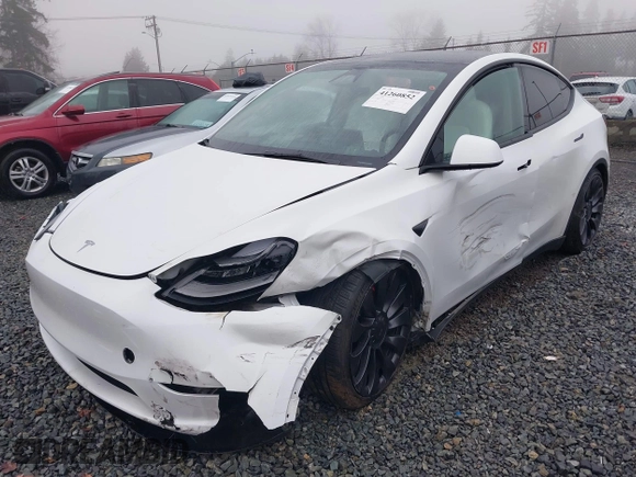 2023 Tesla Model Y Performance z VIN 7SAYGDEF2PF917295, wystawiony jako IAAI lot #41260852 z przebiegiem 23 295 mil mil oraz . Historia ofert i sprzedaży dostępna na DreamBid. Obrazek 6.