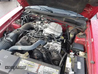 1996 Ford Mustang with VIN 1FALP4042TF223781, listed as a IAAI auction lot 41197025 with 116,106 mi miles. Bid and sale history available at carsss.com. Image 10.