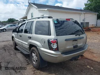 2004 Jeep Grand Cherokee Laredo with VIN 1J4GW48N84C234194, listed as a IAAI auction lot 42388702 with 237,643 mi miles and . Bid and sale history available at DreamBid. Image 3.